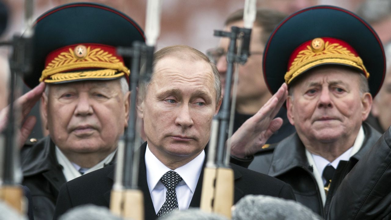 Russian President Vladimir Putin attends a wreath-laying ceremony at the Tomb of the Unknown Soldier in Moscow on Tuesday, February 23. It was Defender of the Fatherland Day, a nationwide holiday that honors the military.