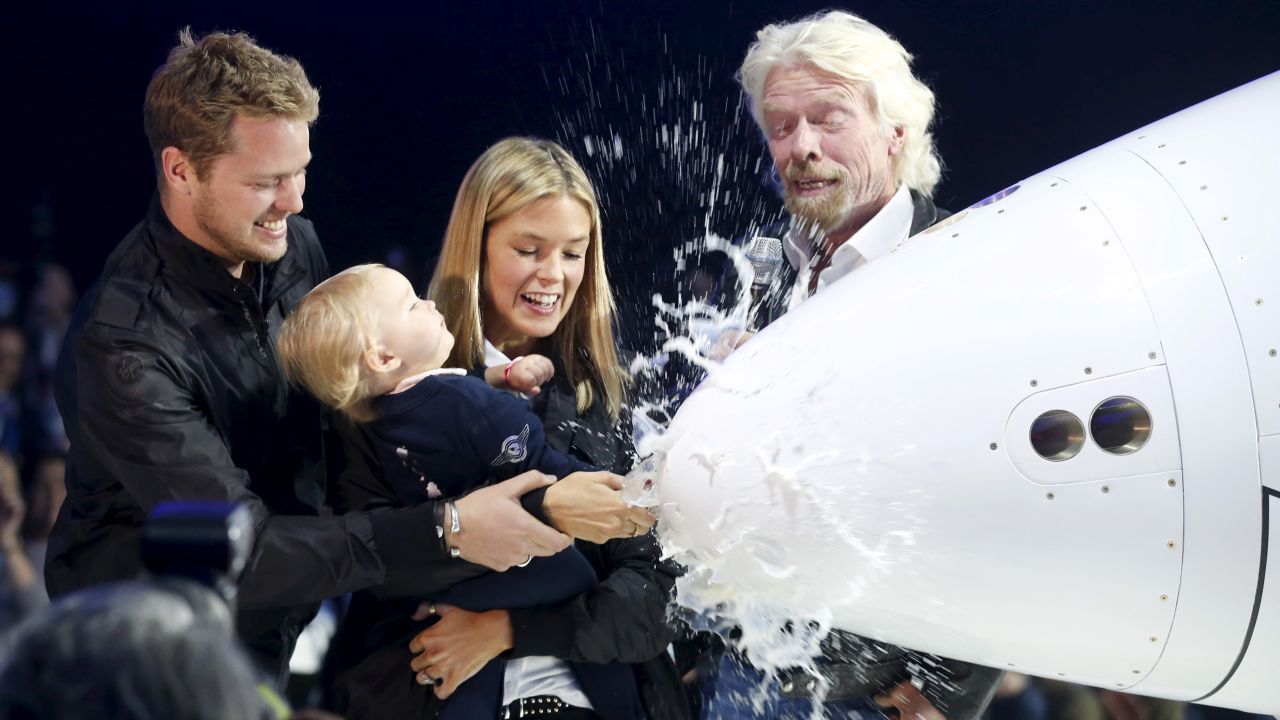 Businessman Richard Branson, right, stands with his son, daughter-in-law and 1-year-old granddaughter as they dedicate <a href="http://www.cnn.com/2016/02/19/us/virgin-galactic-new-space-plane/" target="_blank">Virgin Galactic's new private spaceship</a> on Friday, February 19. Once the craft has fully checked out, Virgin Galactic plans to use it to ferry passengers up 50 miles above Earth's surface -- a height the company said will qualify them as "bona fide space tourists."