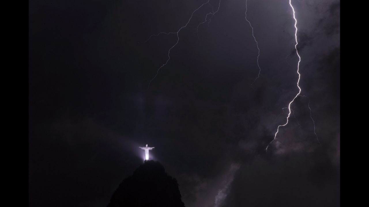 Lightning strikes in front of the Christ the Redeemer statue in Rio de Janeiro on Tuesday, February 23.
