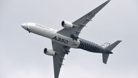 The Airbus A350XWB performs at Le Bourget airport, near Paris, on June 15, 2015 during the International Paris Airshow. AFP PHOTO /MIGUEL MEDINA        (Photo credit should read MIGUEL MEDINA/AFP/Getty Images)