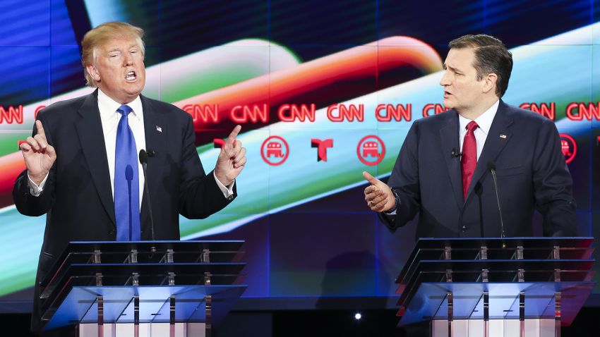 Donald Trump (L) and Sen. Ted Cruz (R-TX) talk over each other in the Republican presidential debate at the Moores School of Music at the University of Houston on February 25, 2016 in Houston, Texas. 