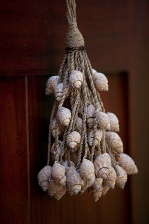 The Antigua-based Jumby Bay, a Rosewood Resort (that's the full name) has opted for a subtler Do Not Disturb sign. The door hangers are made exclusively for the resort by a local Antigua artist from local shells and raffia palms (guests can special-order the artwork to bring home).