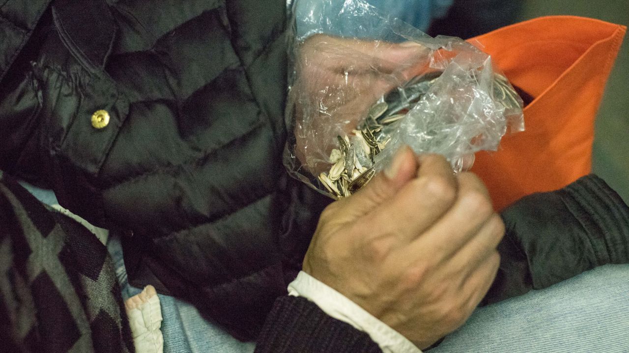 Any prepared urban traveler comes with snacks -- in this case, sunflower seeds.