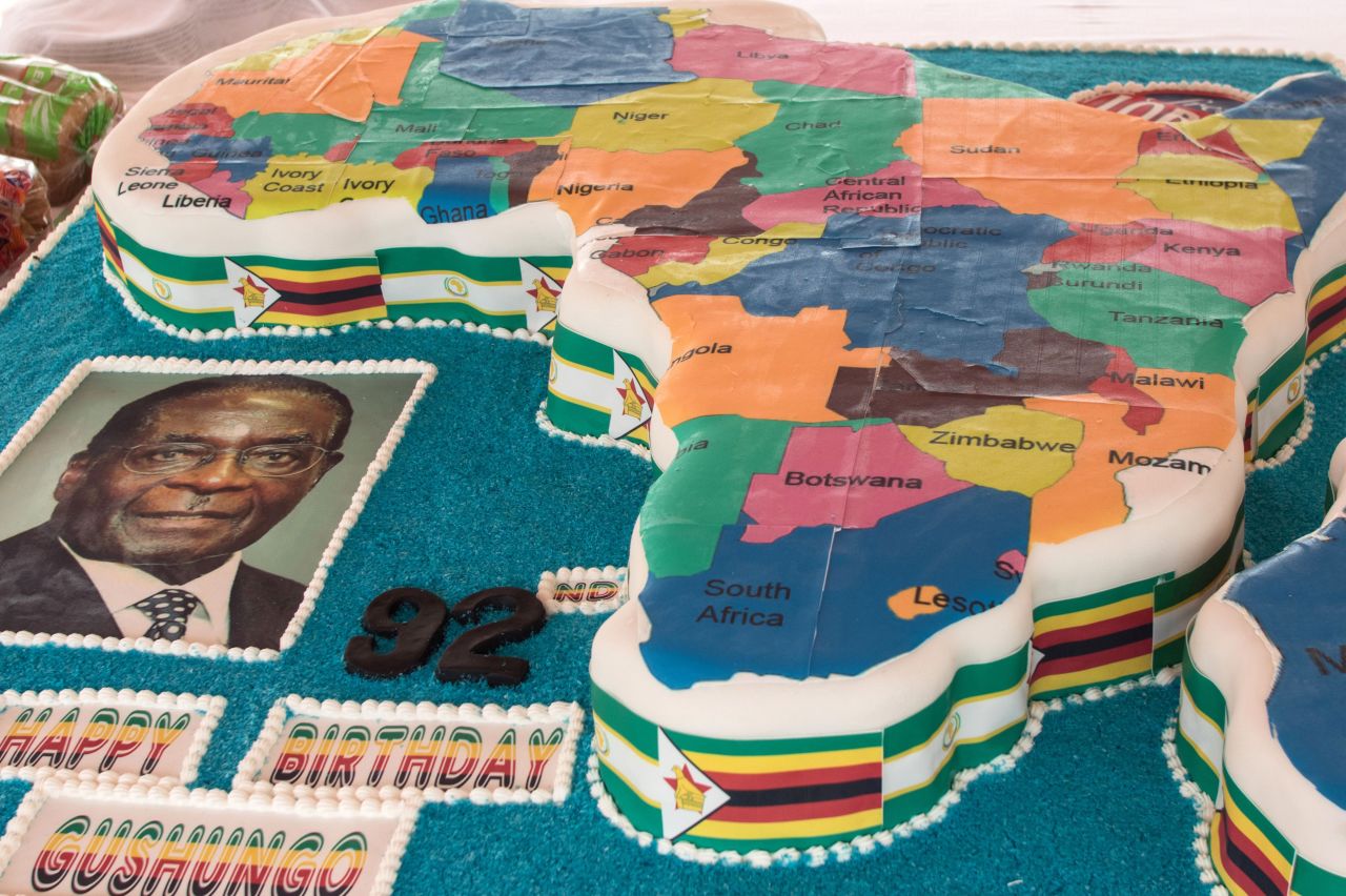 Another birthday cake presented for Mugabe's 92nd birthday, this time in the shape of a map of Africa, during an event at the Great Zimbabwe monument in Masvingo on February 27, 2016. Nearly 2.5 million Zimbabweans are facing food shortages.