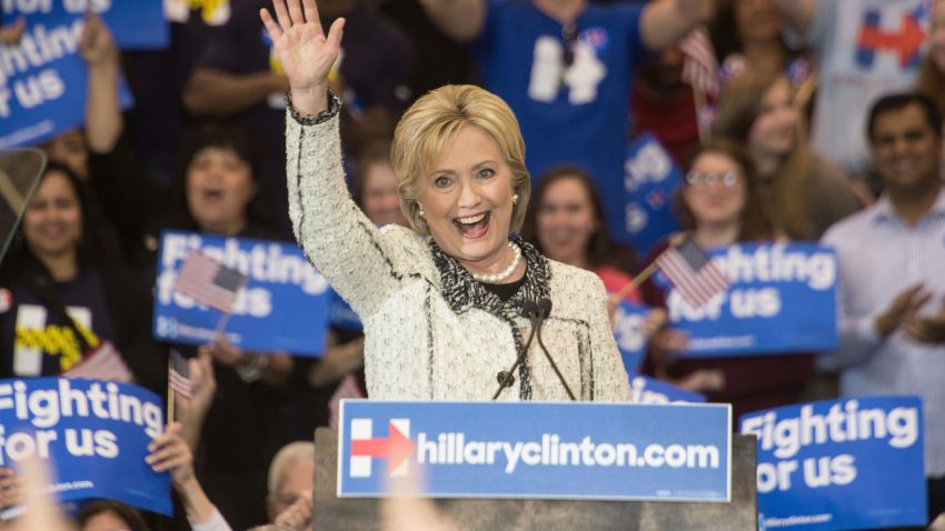 US Democratic presidential candidate Hillary Clinton waves after addressing a primary night rally in Columbia, South Carolina, on February 27, 2016.
Clinton defeated Bernie Sanders by an overwhelming margin in the Democratic primary in South Carolina, projections showed, seizing momentum ahead of the most important day of the nomination race: next week's "Super Tuesday" contests. / AFP / Nicholas Kamm (Photo credit should read NICHOLAS KAMM/AFP/Getty Images)