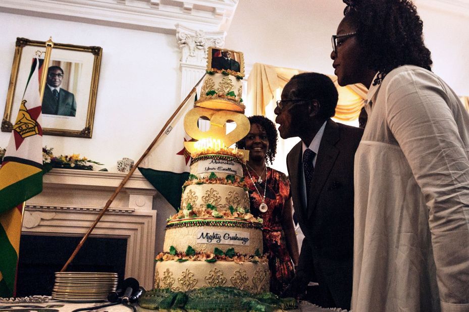 A week earlier, President Mugabe blew candles out on a cake during a surprise party hosted by the President's office in Harare, on Monday, February 22, 2016.