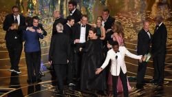 Actor and host Chris Rock  speaks as members of the cast and producers of Spotlight celebrate receiving the award for Best Picture at the 88th Oscars on February 28, 2016 in Hollywood, California. AFP PHOTO / MARK RALSTON / AFP / MARK RALSTON        (Photo credit should read MARK RALSTON/AFP/Getty Images)