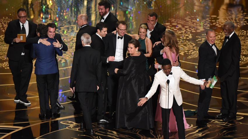 Actor and host Chris Rock speaks as members of the cast and producers of Spotlight celebrate receiving the award for Best Picture at the 88th Oscars on February 28, 2016 in Hollywood, California. AFP PHOTO / MARK RALSTON / AFP / MARK RALSTON (Photo credit should read MARK RALSTON/AFP/Getty Images)