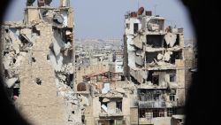 A general view taken from Aleppo's Syrian regime-controlled neighbourdhood of Karm al-Jabal shows heavily damaged buildings on July 30, 2015. AFP PHOTO / GEORGE OURFALIAN        (Photo credit should read GEORGE OURFALIAN/AFP/Getty Images)