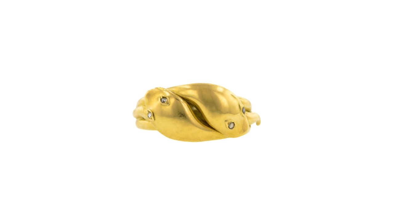 "We love when couples come in looking for a men's engagement ring. Since we specialize in antique and vintage jewelry, we'll show them substantial pieces that incorporate romantic or sentimental imagery. You can't go wrong with a Victorian snake ring, especially if it has entwined double snakes, like this turn of the century example. <br />Prince Albert gave Queen Victoria a snake ring to celebrate their love, and they've been popular love tokens ever since. Luckily, many antique snake rings were originally worn by men and are relatively easy to find in larger sizes." -- Elizabeth Doyle and Irene Pamela Doyle, Co-Owners and Founders of<a href="https://www.doyledoyle.com/" target="_blank" target="_blank"> Doyle & Doyle </a>