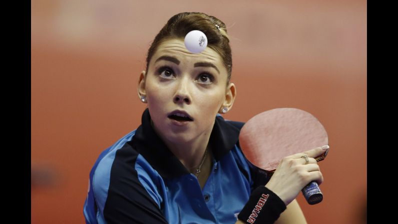 Bernadette Szocs, a Romanian table-tennis player, focuses on the ball Monday, February 29, during the World Team Table Tennis Championships. The tournament is taking place in Kuala Lumpur, Malaysia.