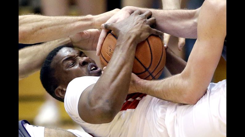 Rutgers' Ibrahima Diallo battles Northwestern players for a loose ball on Saturday, February 27.