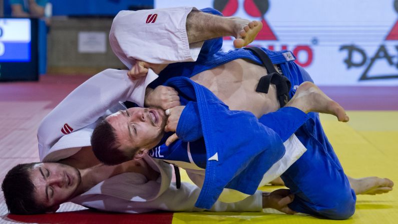Russia's Aslan Lappinagov, left, grabs Czech opponent Jaromir Musil during the European Open judo tournament on Sunday, February 28. Musil won the match and went on to finish second in their weight class.