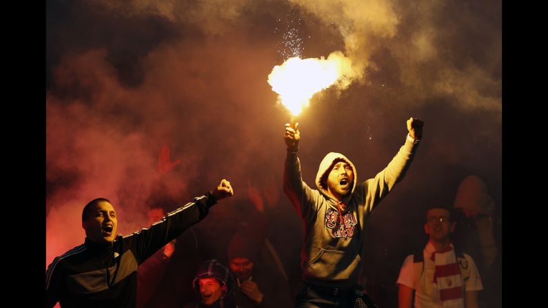 Fans of Red Star Belgrade cheer the Serbian soccer team during its derby match against Partizan on Saturday, February 27.