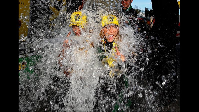 Drag racer Leah Pritchett is doused with a cooler full of ice water after she won the Carquest Nationals in Chandler, Arizona, on Sunday, February 28.