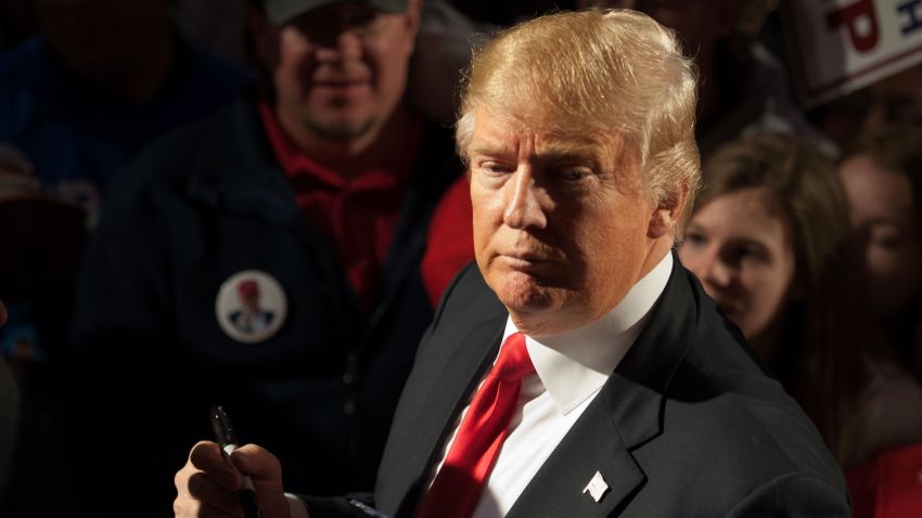 Republican presidential candidate Donald Trump signs autographs for supporters at the conclusion of a Donald Trump rally at Millington Regional Jetport on February 27, 2016 in Millington, Tennessee.