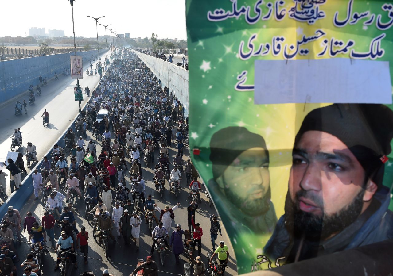 Pakistani demonstrators march during a protest against the execution of convicted murderer Mumtaz Qadri in Karachi on February 29, 2016. 