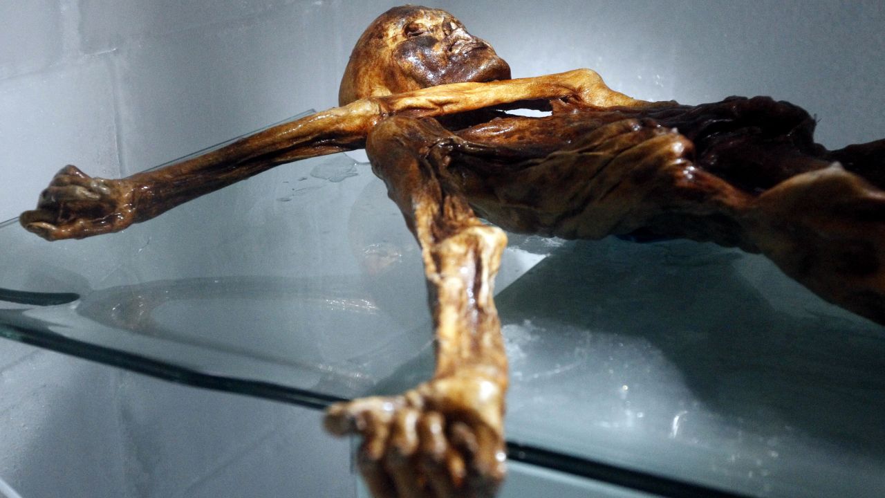 Otzi's left arm cover his throat. This was one of the problems researchers had to overcome.