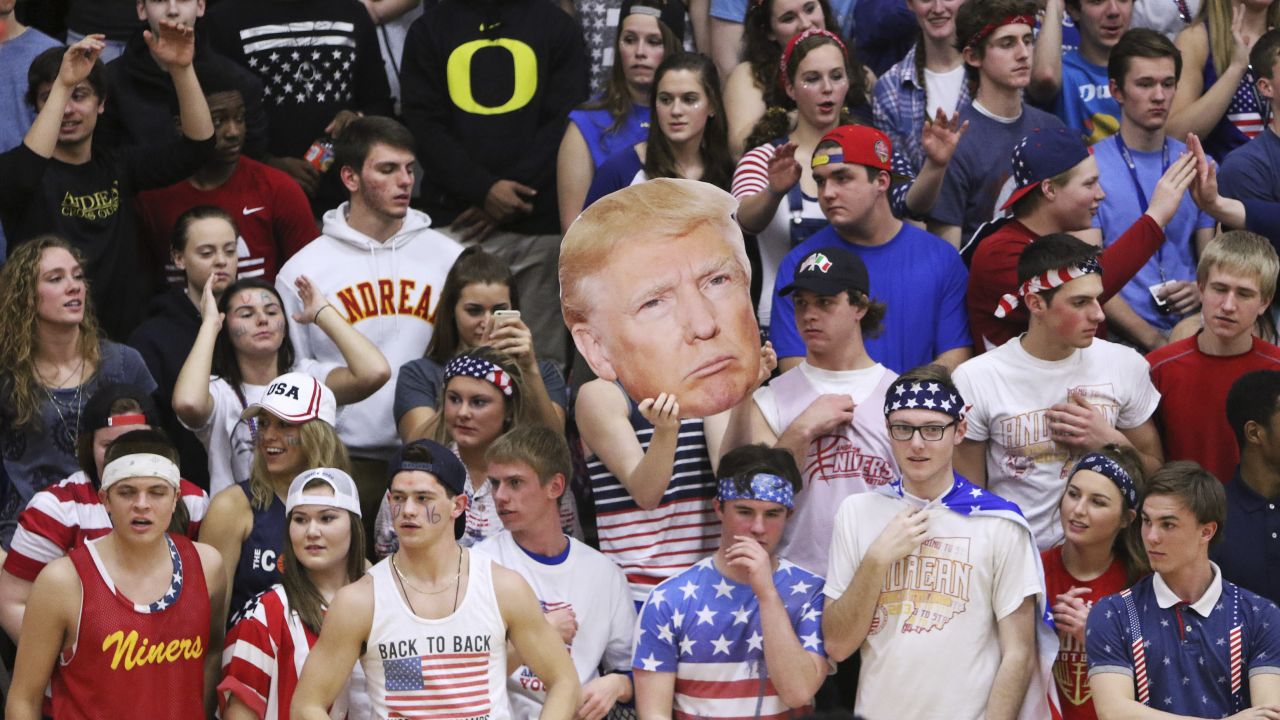 Fans of Andrean High School held up a picture of GOP presidential candidate Donald Trump and shouted chants like "Build a Wall" during a basketball game against Bishop Noll Institute on Friday in Merrillville, Indiana. 