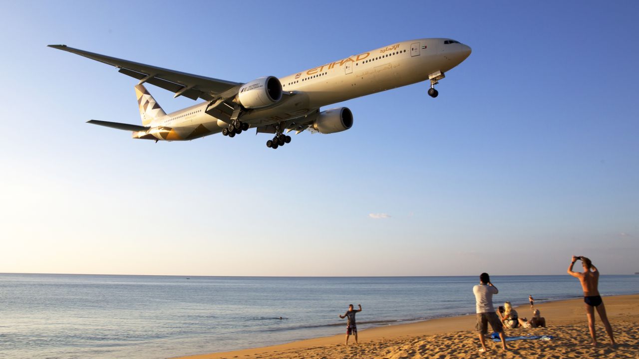 "This picture was taken end-December 2015 at Phuket International Airport," says Singaporean plane-spotter Kok Chwee Sim.  "When the planes land from the west, they swoop low over the beach and this is a thrill for beachcombers and aviation spotters. The plane depicted here is a B777-300ER of Etihad Airways."