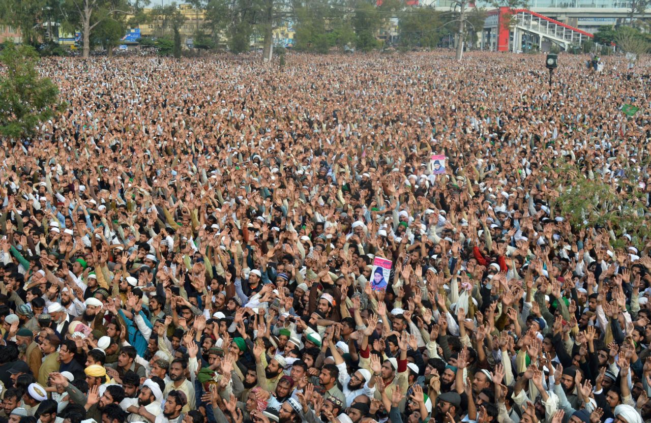 Thousands shout slogans during Qadri's funeral on March 1, 2016. 