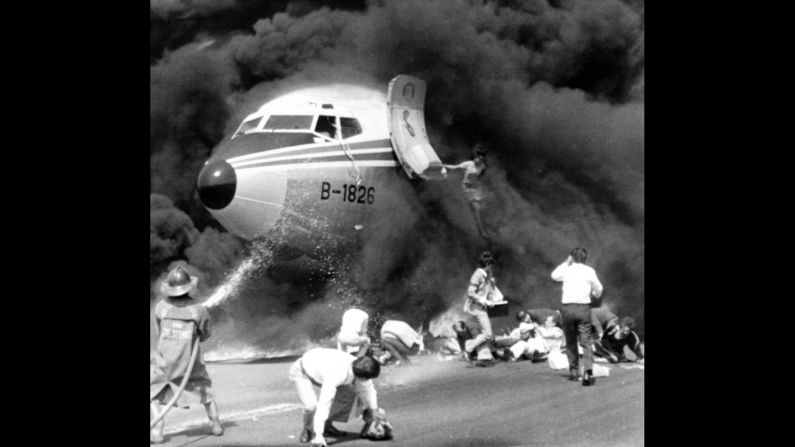 <strong>Plane hero:</strong> A flight attendant helped save the day when a China Airlines jet undershot the runway and caught fire in Manila, Philippines, on February 27, 1980. <a href="index.php?page=&url=https%3A%2F%2Fnews.google.com%2Fnewspapers%3Fnid%3D2194%26dat%3D19800227%26id%3DA74yAAAAIBAJ%26sjid%3Dde4FAAAAIBAJ%26pg%3D5199%2C1306264%26hl%3Den" target="_blank" target="_blank">Wang Wen Hwang </a>stayed aboard the burning plane, even as her own clothing caught on fire, <a href="index.php?page=&url=http%3A%2F%2Fwww.airliners.net%2Faviation-forums%2Fgeneral_aviation%2Fread.main%2F2036510%2F6%2F" target="_blank" target="_blank">to help several passengers evacuate.</a> She's pictured here leaping to safety.