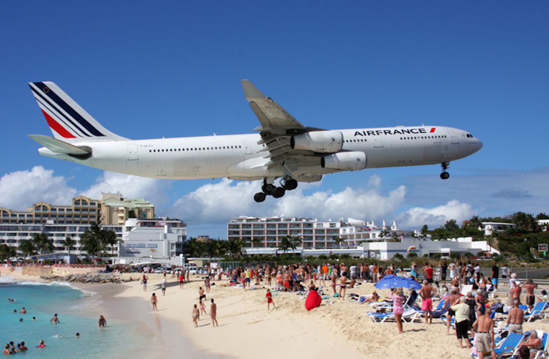 This photo of an Air France Airbus A340 flying into Princess Juliana International Airport was taken at St. Maarten's Maho Beach.