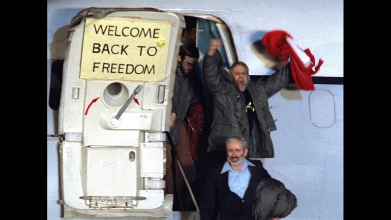 <strong>U.S. hostages are released:</strong> David Roeder -- pictured here waving -- was one of 52 Americans held hostage for 444 days at the U.S. Embassy in Tehran, Iran. The<a href="index.php?page=&url=http%3A%2F%2Fwww.cnn.com%2F2013%2F09%2F15%2Fworld%2Fmeast%2Firan-hostage-crisis-fast-facts%2F" target="_blank"> Iran hostage crisis</a> began in November 1979, when Iranian students stormed the embassy to demand the extradition of Shah Mohammed Reza Pahlavi from the United States. It ended with the release of captives on January 20, 1981.