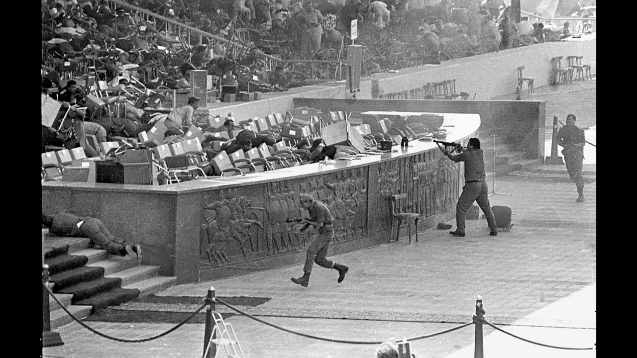 <strong>A peacemaker's assassination:</strong> In October 1981, military officers <a href="http://www.cnn.com/2011/10/06/world/meast/egypt-sadat-assassination/" target="_blank">open fire </a>on Egyptian President Anwar Al-Sadat as he watches an annual parade in honor of Egypt's 1973 war with Israel. Al-Sadat, who won a Nobel Peace Prize for a 1979 peace treaty he signed with Israel, was killed in the shooting along with several other dignitaries.