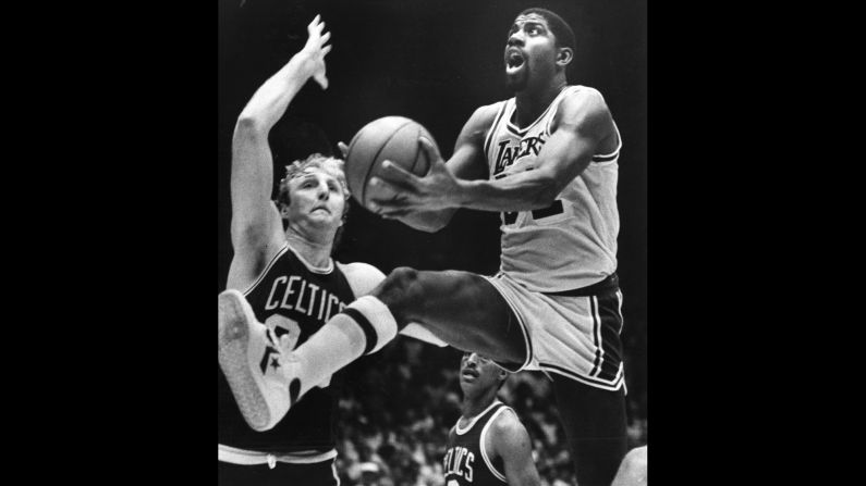 <strong>Rivalry reignited:</strong> Magic Johnson, right, and Larry Bird go head to head as the Los Angeles Lakers battle the Boston Celtics for the NBA title in June 1984. The seven-game playoff series, won by the Celtics, added fuel to a Johnson-Bird rivalry that went back to their college days.