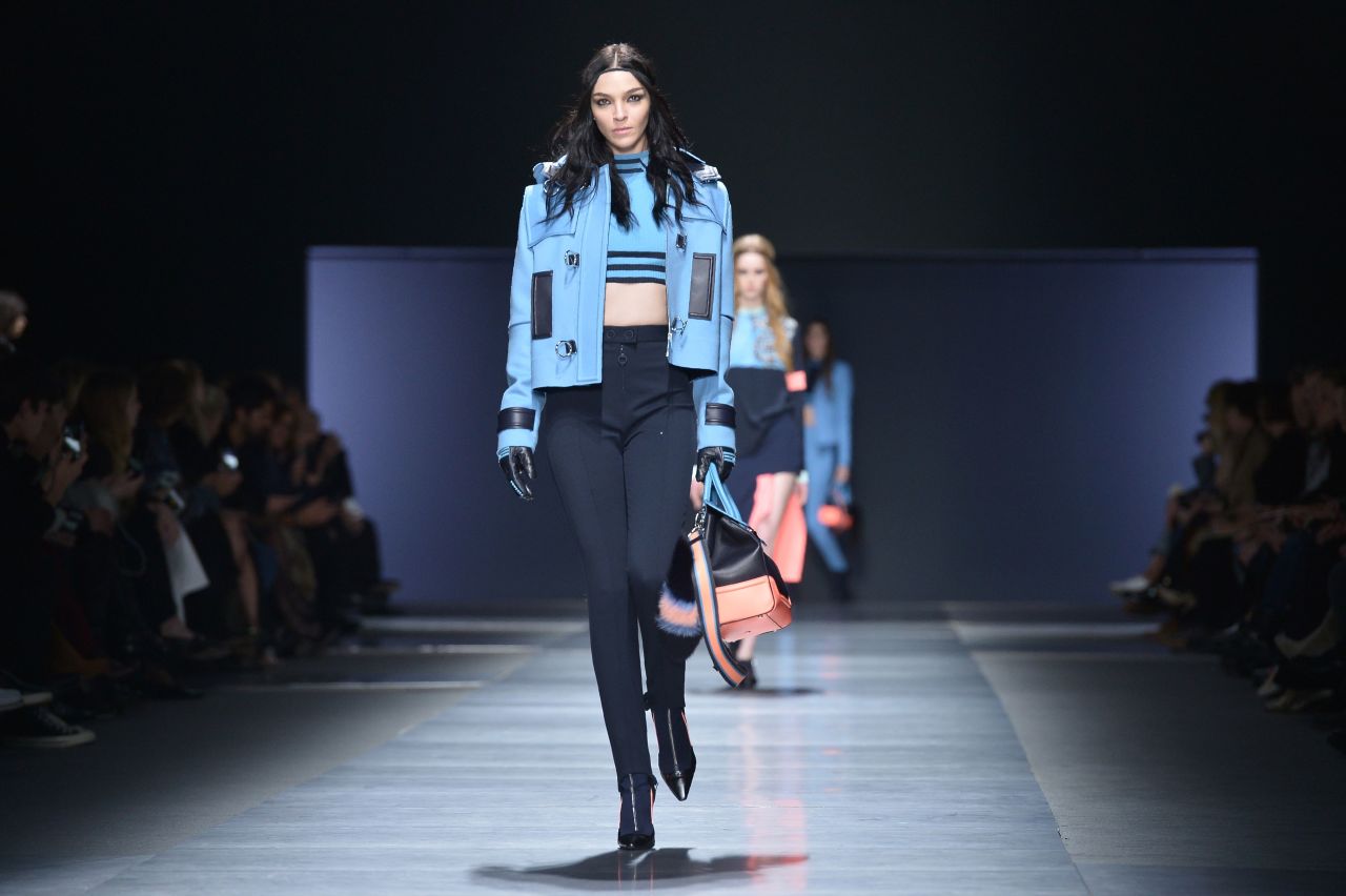 At fashion house Versace, designer Donatella Versace showcased bold patterns and bright colors. 