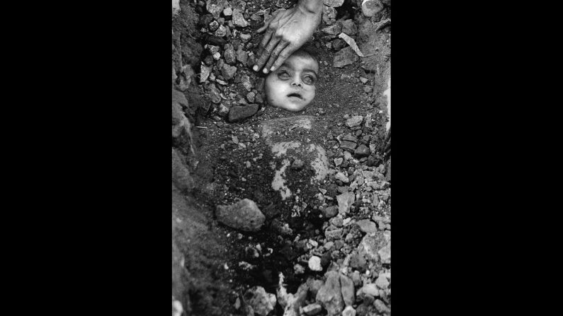 <strong>The Bhopal incident:</strong> The unknown child pictured here has become the icon of a terrible accident that took place in Bhopal, India, at the Union Carbide pesticide plant on December 2, 1984. Known as the world's <a href="index.php?page=&url=http%3A%2F%2Fwww.theatlantic.com%2Fphoto%2F2014%2F12%2Fbhopal-the-worlds-worst-industrial-disaster-30-years-later%2F100864%2F" target="_blank" target="_blank">worst industrial disaster,</a> the Bhopal incident involved the release of several poisonous gases and led to an estimated 15,000 deaths. 