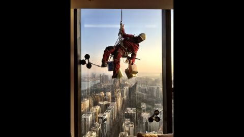 UNITED ARAB EMIRATES: "This is not an easy gig. Washing windows by hand in Abu Dhabi. All 90 floors." - CNN's Jon Jensen <a href="http://instagram.com/jonjensencnn" target="_blank" target="_blank">@jonjensencnn</a>.