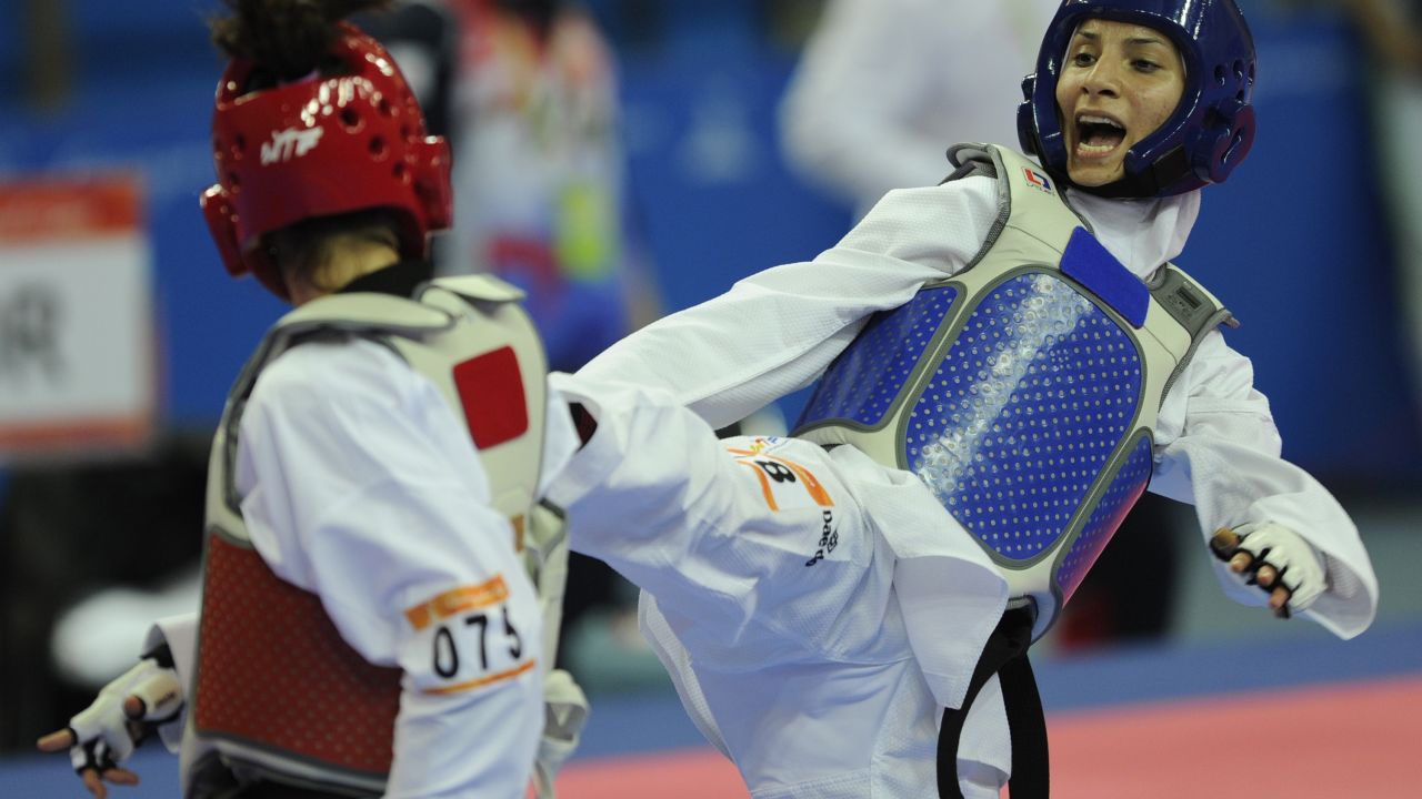 Judoka Raheleh Asemani (right) is among the athletes bidding to compete for the team of refugees in Rio