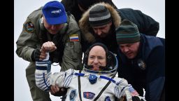 Ground personnel help International Space Station (ISS) crew member Scott Kelly of the U.S. to get off the Soyuz TMA-18M space capsule after landing near the town of Dzhezkazgan, Kazakhstan, Wednesday, March 2, 2016. U.S. astronaut Kelly and Russian cosmonaut Mikhail Kornienko returned to Earth on Wednesday after spending almost a year in space in a ground-breaking experiment foreshadowing a potential manned mission to Mars. (Krill Kudryavtsev/Pool Photo via AP)