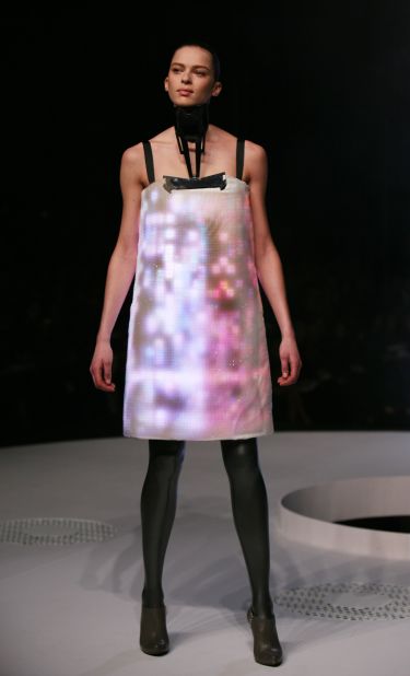 Tiled "Airborne", the Autumn-Winter 2007 collection featured video dresses -- each with 15,000 LEDs embedded into the fabric. These "screens" depicted cityscapes as seen from Google Earth. The collection was seen as a commentary on the environment.
