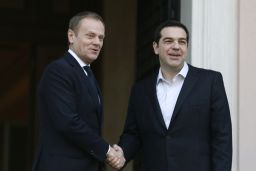 The European Council's Donald Tusk, left, meets Greek Prime Minister Alexis Tsipras.