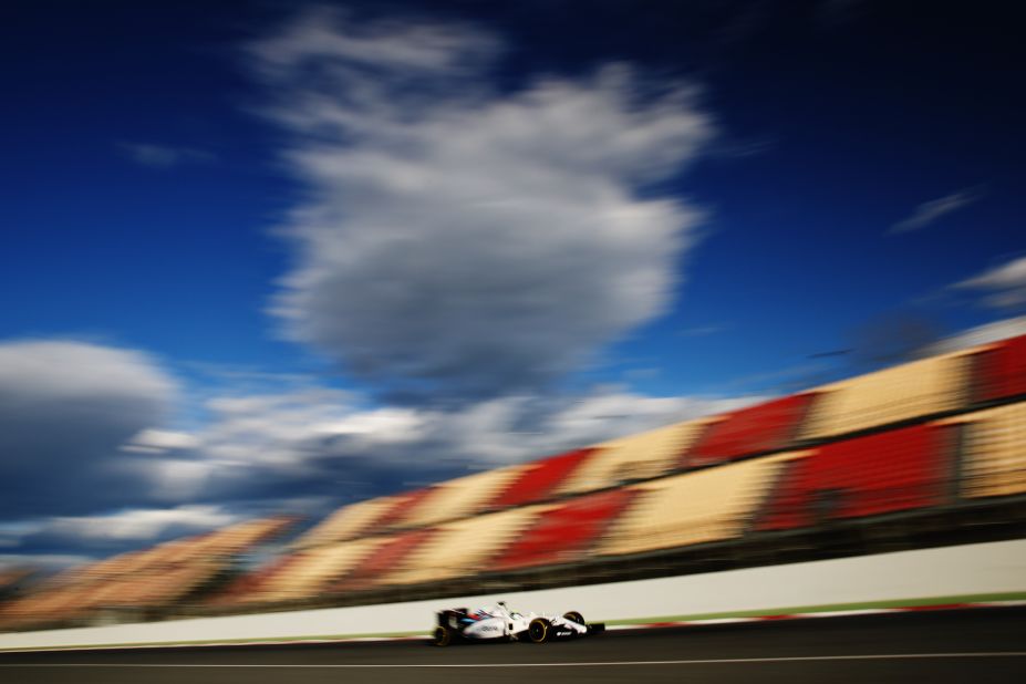 Felipe Massa of Williams speeds by the empty grandstand on day three of the second week of testing. The Brazilian finished second fastest on Thursday with a time of 1:23.192.