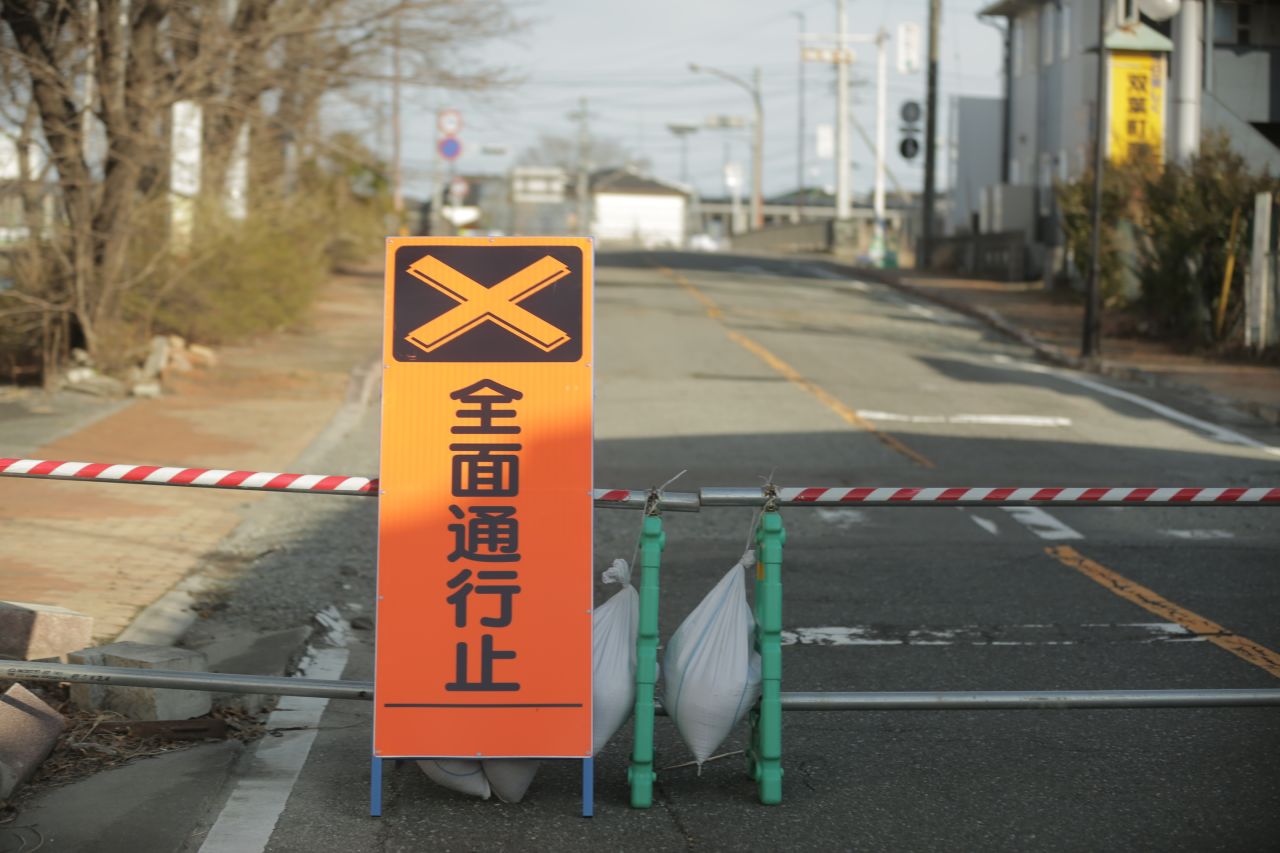 A road block marks the entrance to the Fukushima exclusion zone.