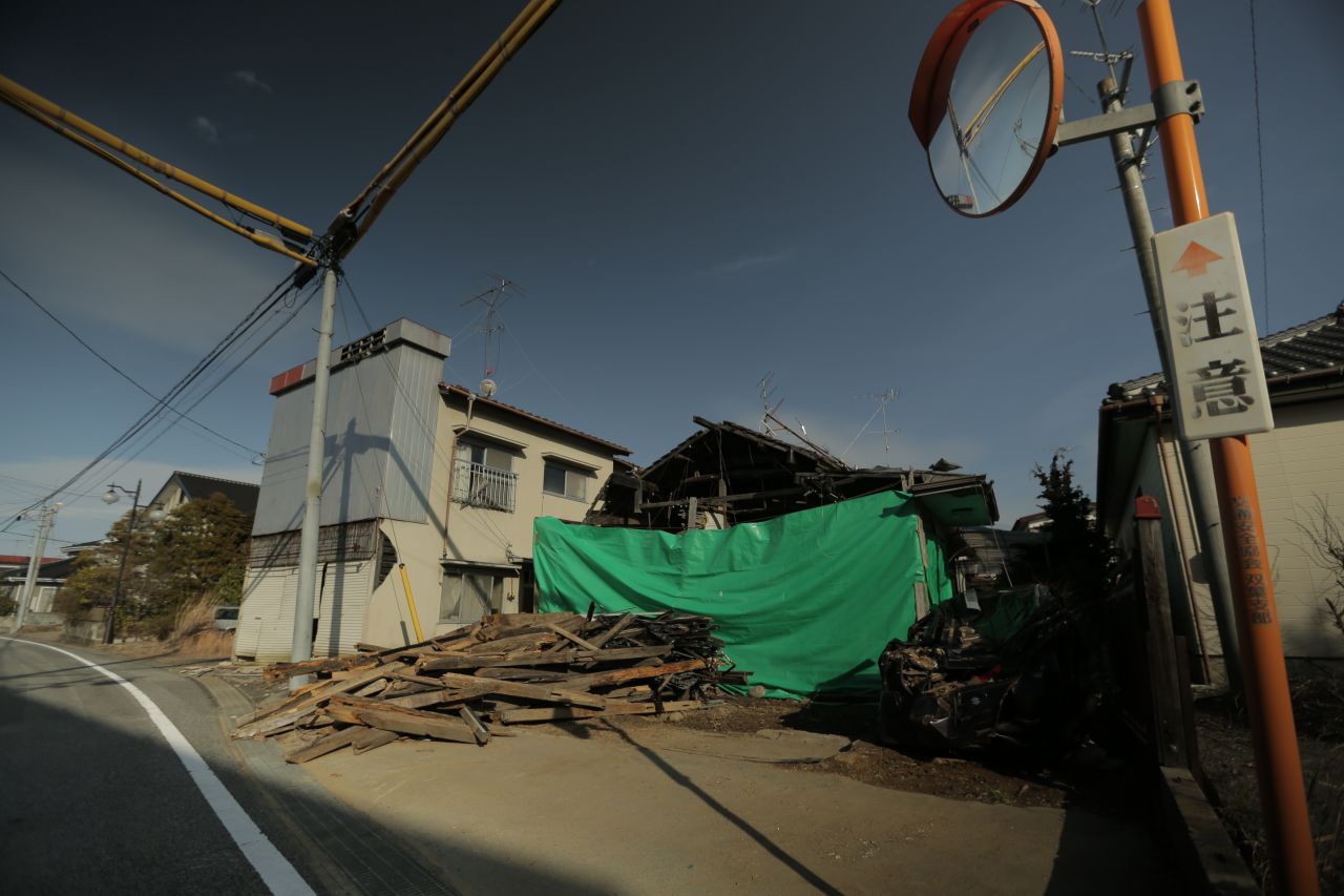 Though many homes were left undamaged by the earthquake and tsunami, residents soon had to abandon them as the Fukushima nuclear plant went into meltdown. 
