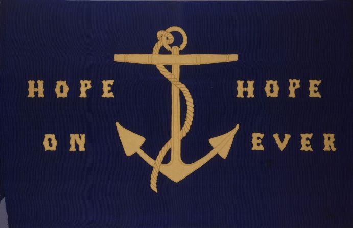The motto "hope on hope ever" -- by British writer of maritime history John Barrow -- is embroidered onto this silk flag dating back to the 1850s. 