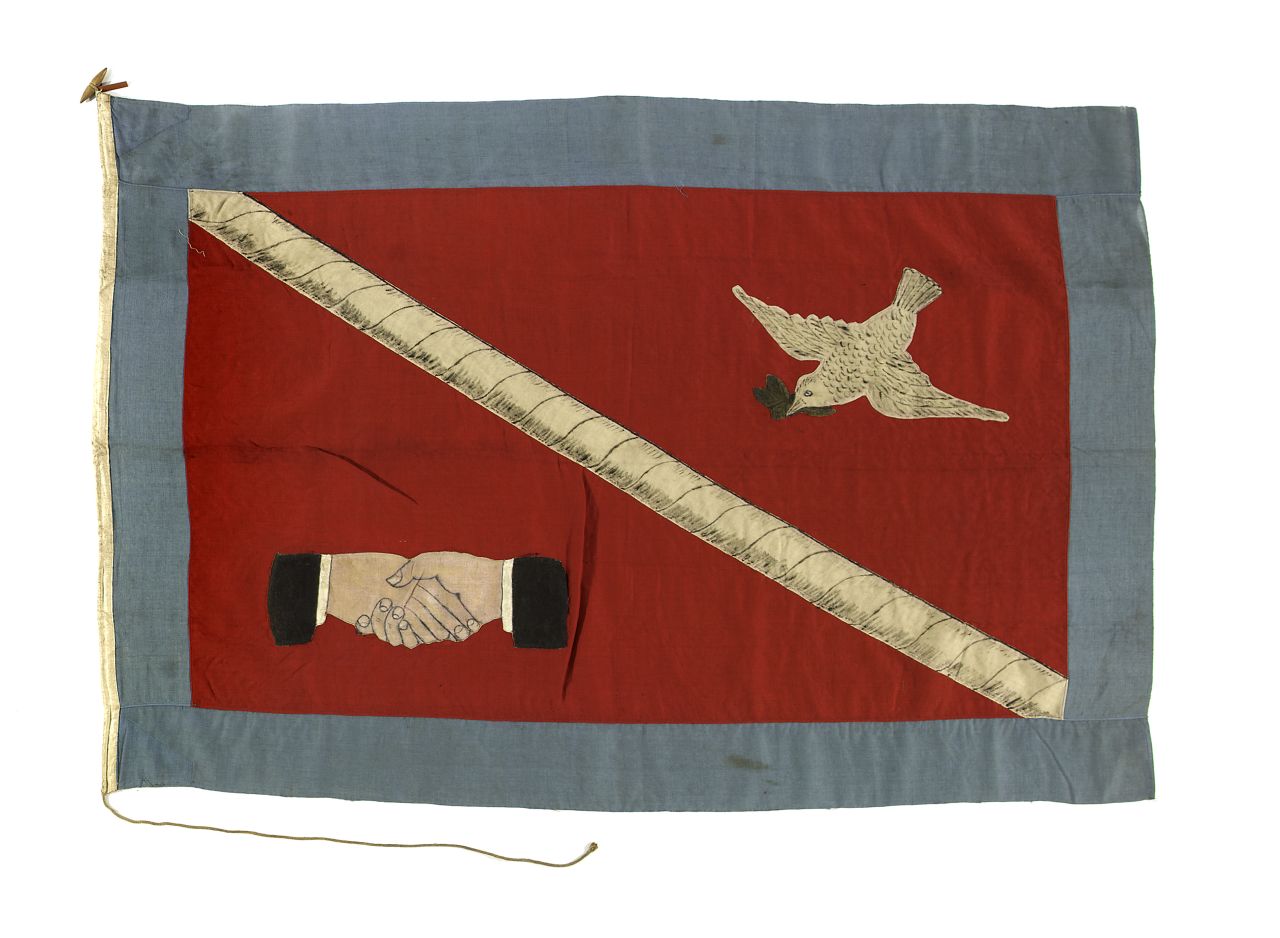 The house flag of the India Rubber Gutta Percha and Telegraph Works Co. Ltd, London, dates back to 1911. A white telegraph cable runs through the middle.<br />At sea, flags can be used to denote the ownership of a vessel, or as a way of relaying messages. "Until the 17th century, signaling with flags was restricted to a handful of quite simple visual signals, sometimes supported by the firing of a gun," says James Davey, the National Maritime Museum's curator of naval history.<br />"However, by the end of the 18th century, ships were able to communicate as many as 300 different signals using flags, as signal technology grew ever more precise and complicated. A key part of any young officer's training was learning flag combinations by heart, as it was essential that they could read and pass on a message as quickly as possible." 