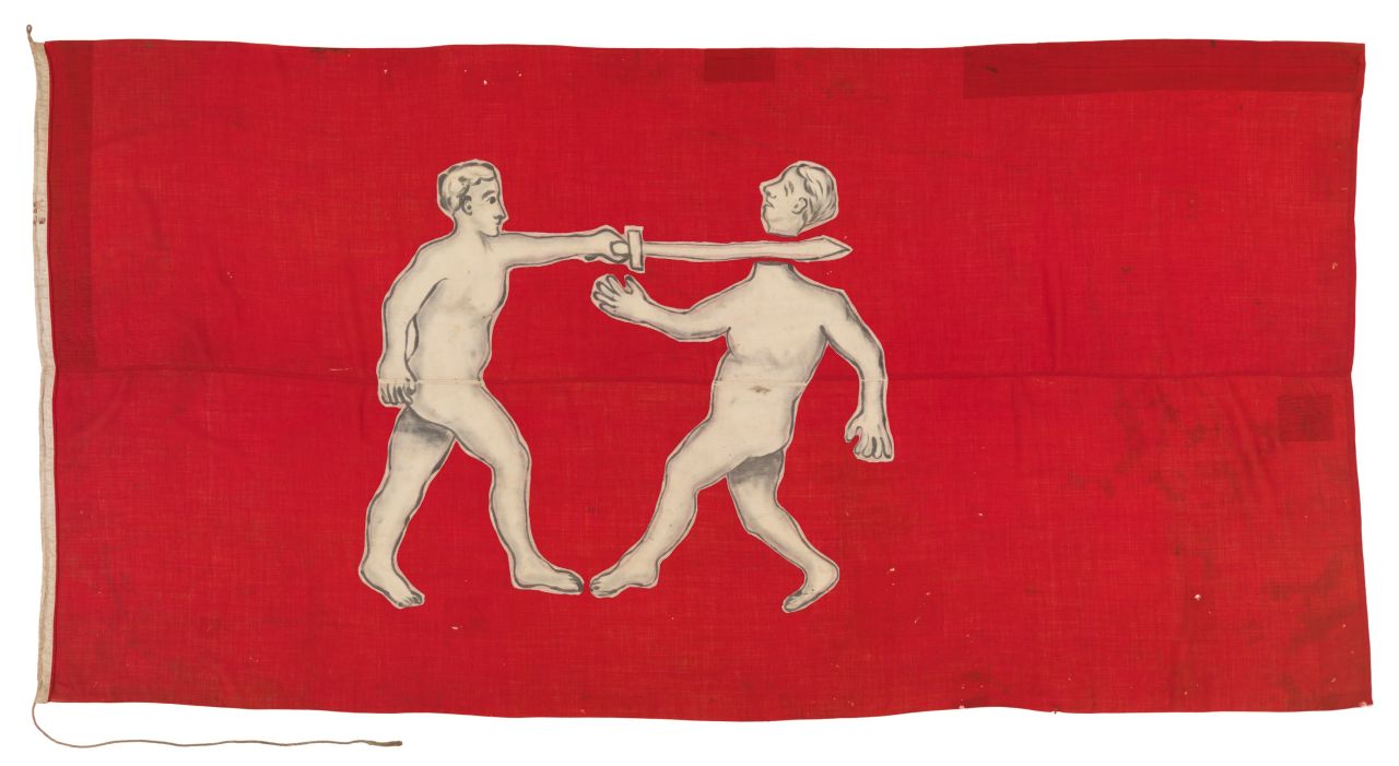 This West African flag, also believed to be from the Itsekiri ethnic group, was brought to the UK following the <a href="https://en.wikipedia.org/wiki/Benin_Expedition_of_1897" target="_blank" target="_blank">Benin Expedition of 1897</a>. British troops invaded Benin City, in what is now southern Nigeria.  