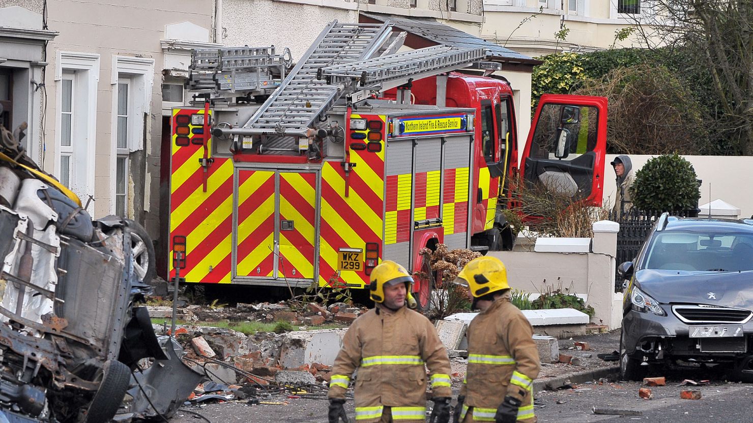 Thieves broke into a Northern Ireland fire station and went on wild joyride in a stolen fire engine, damaging houses and cars.


