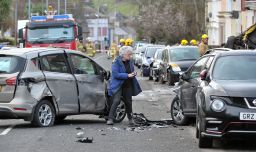 Thieves broke into a Northern Ireland fire station and went on wild joyride in a stolen fire engine, damaging houses and cars.