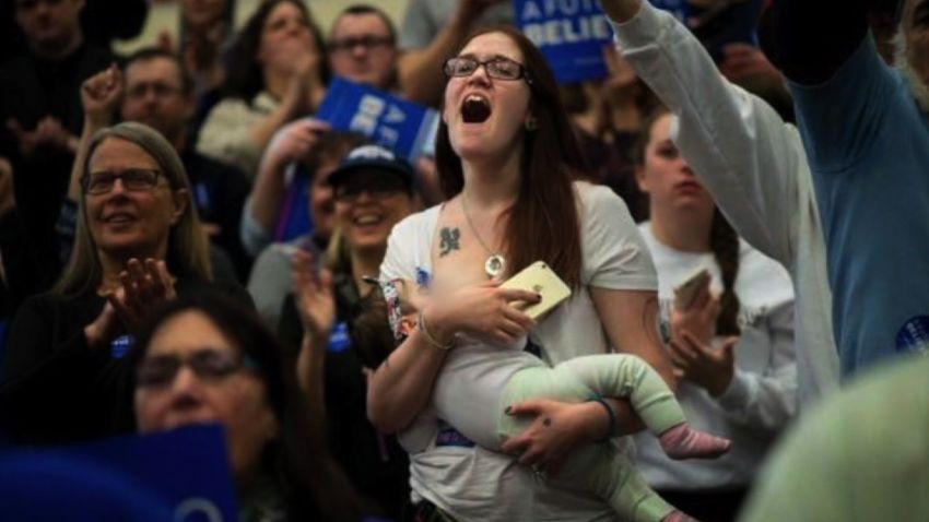 Mom breastfeeding baby Bernie Sanders rally pkg_00010625.jpg