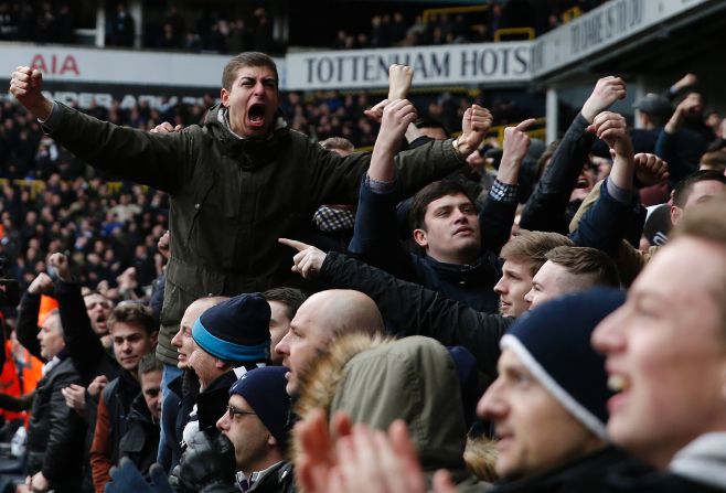 Spurs fans celebrate Kane's goal by goading Arsenal fans in attendance.