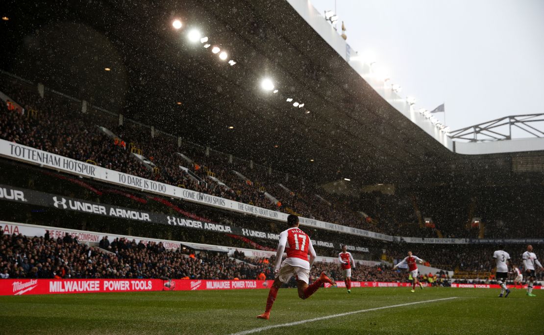 Arsenal's Chilean striker Alexis Sanchez celebrates after scoring his side's second goal during against Tottenham.