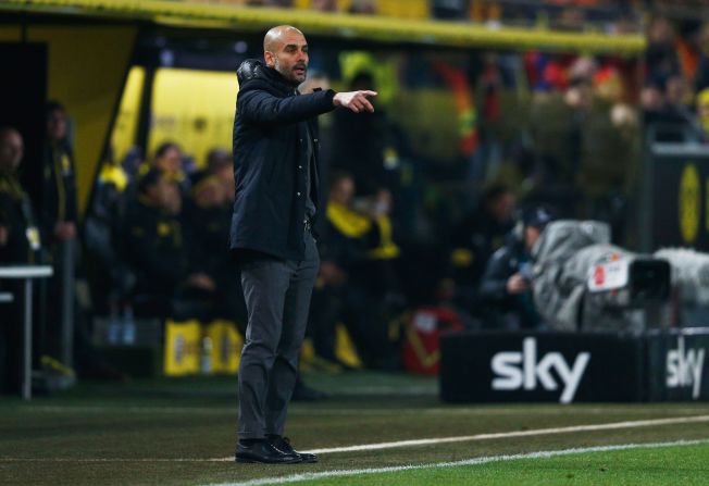 Josep Guardiola manager of Bayern Munich gestures during the Bundesliga match between Borussia Dortmund and FC Bayern Muenchen at Signal Iduna Park on March 5, 2016 in Dortmund, Germany.  