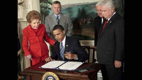 Reagan, from left, Rep. Dana Rohrabacher, Sen. Richard Lugar and Rep. Elton Gallegly watch President Barack Obama sign a bill on June 2, 2009, in Washington. Obama signed the "Ronald Reagan Centennial Commission Act" to honor Ronald Reagan on his 100th birth anniversary in 2011.  